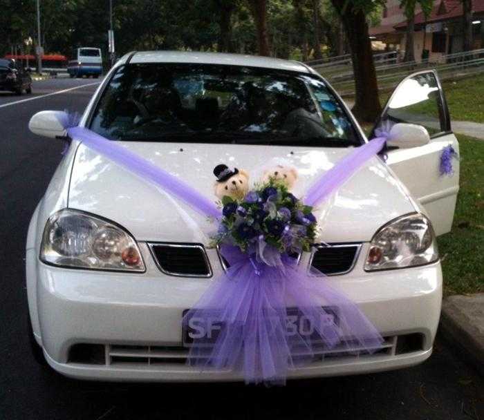 Как украсить машину на свадьбу Оформление свадебного автомобиля - неотъемлемая часть подготовки к праздничной церемонии Выбирайте один из предложенных в статье вариантов или сочетайте сразу несколько - и ваш кортеж станет заметным